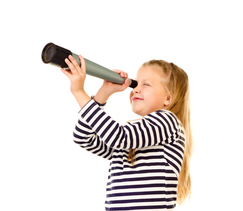 girl looking through telescope